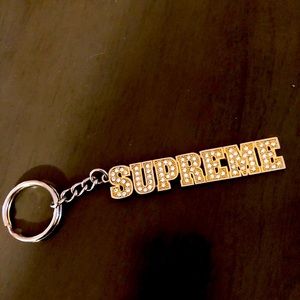 Supreme gold key chain